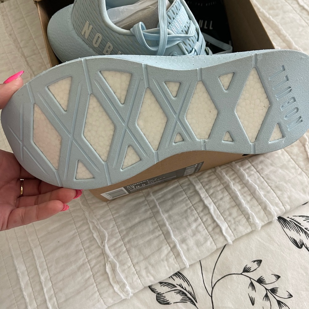 Brand new NoBull runner plus pastel blue. W9.5 M8.5